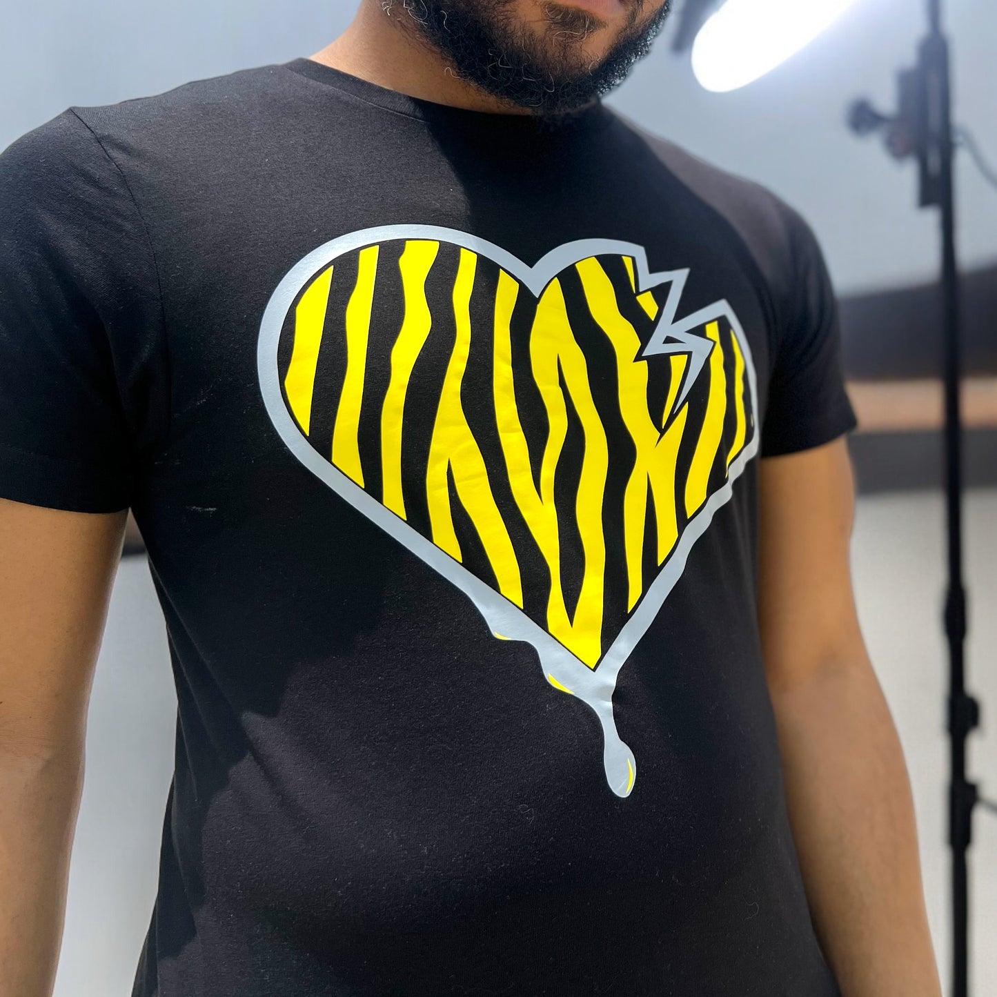 Crooked Hearted Zebra Stripes Unisex T-Shirt (Black Shirt Grey & Yellow)